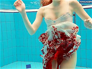 super hot grind red-haired swimming in the pool